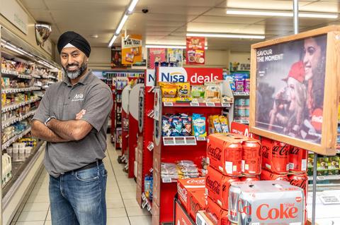Man stood in a convenience store