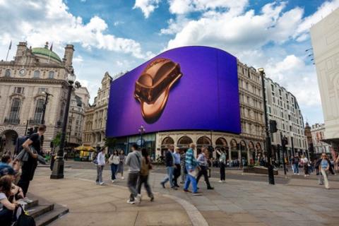 Cadbury takes over Piccadilly Lights with its iconic Cadbury Dairy Milk chunk