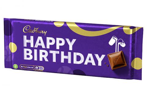 Cadbury Dairy Milk bar with Happy Birthday written on the front